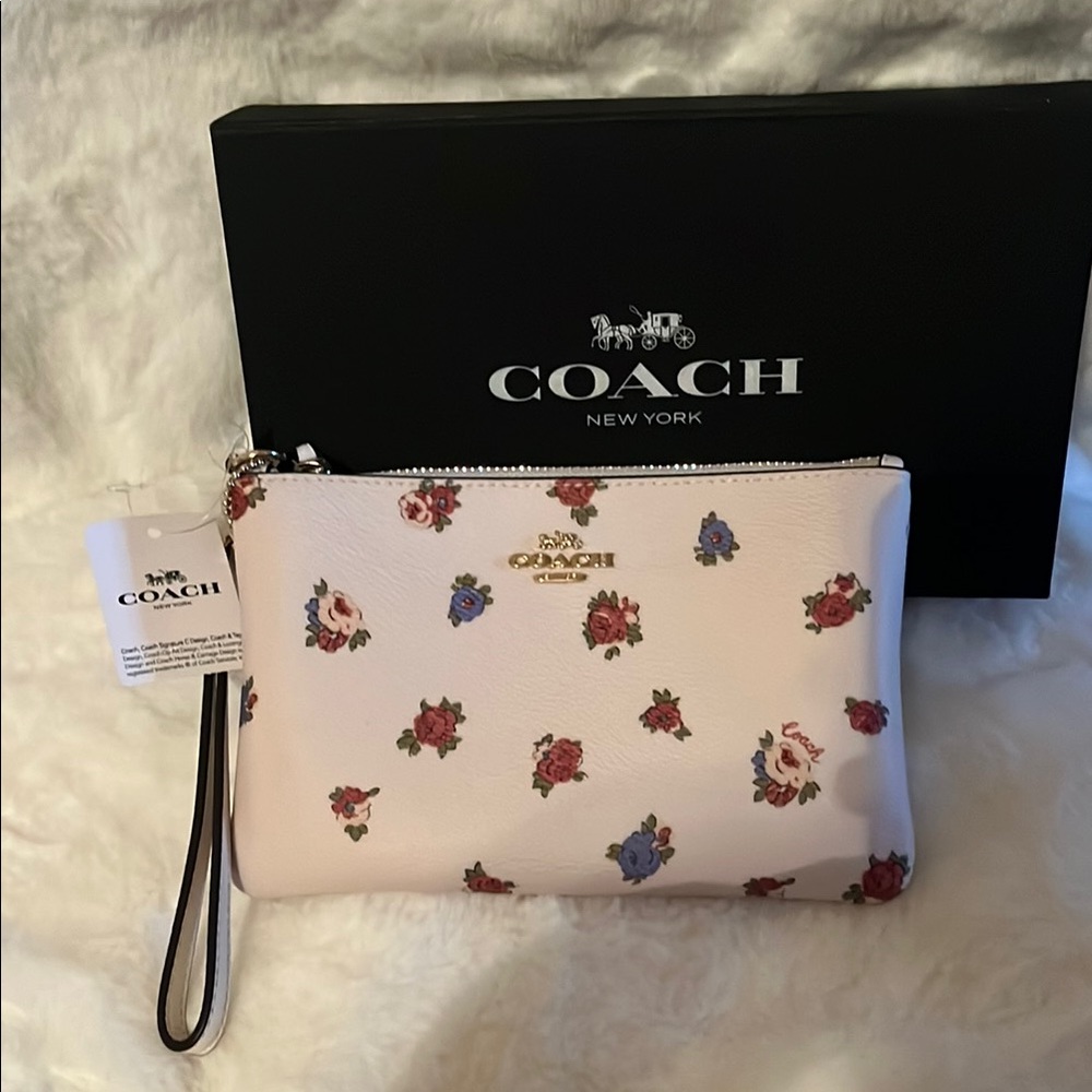 Coach Floral Wristlet.